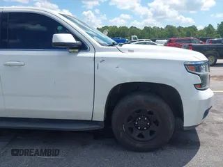2018 Chevrolet Tahoe Commercial z VIN 1GNLCDEC1JR155210, wystawiony jako IAAI lot #42845068 z przebiegiem 159 456 mil mil oraz . Historia ofert i sprzedaży dostępna na DreamBid. Obrazek 17.