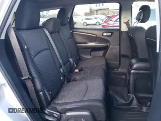 2014 Dodge Journey SXT z VIN 3C4PDDBG7ET282202, wystawiony jako Copart lot #82870614 z przebiegiem 153 404 mil mil oraz Czysty tytuł • Clean title. Historia ofert i sprzedaży dostępna na DreamBid. Obrazek 11.