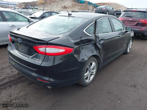 2015 Ford Fusion Titanium Hybrid with VIN 3FA6P0RU6FR299374, listed as a IAAI auction lot 41576007 with 191,285 mi miles. Bid and sale history available at carsss.com. Image 4.