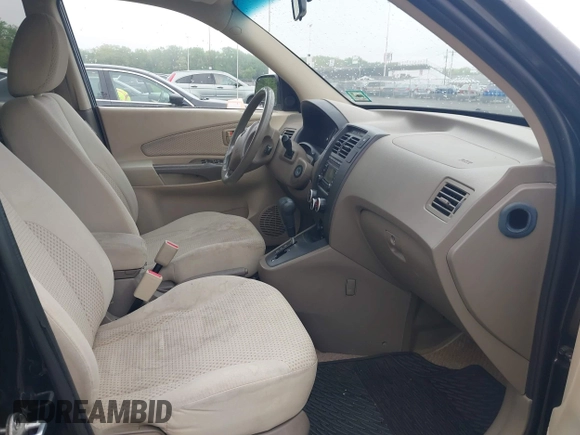 2009 Hyundai Tucson GLS with VIN KM8JM12B59U990027, listed as a IAAI auction lot 42195935 with 170,875 mi miles. Bid and sale history available at carsss.com. Image 5.