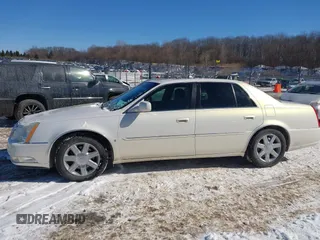 2006 Cadillac DTS 1SC z VIN 1G6KD57Y86U102513, wystawiony jako IAAI lot #41607409 z przebiegiem 102 438 mil mil oraz . Historia ofert i sprzedaży dostępna na DreamBid. Obrazek 14.