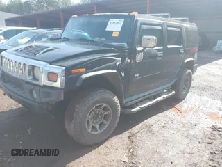 2003 Hummer H2 with VIN 5GRGN23U33H144379, listed as a IAAI auction lot 41452982 with 227,746 mi miles. Bid and sale history available at carsss.com. Image 2.
