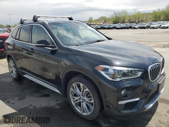 2017 BMW X1 xDrive28i with VIN WBXHT3Z38H4A58005, listed as a Copart auction lot 55837805 with 50,318 mi miles and Salvage title. Bid and sale history available at DreamBid. Image 4.