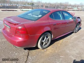 2004 Pontiac Grand Prix GT1 with VIN 2G2WP522741126274, listed as a IAAI auction lot 41439519 with 86,643 mi miles. Bid and sale history available at carsss.com. Image 4.