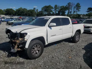 2018 Toyota Tacoma SR5 z VIN 3TMAZ5CN1JM058423, wystawiony jako Copart lot #57665685 z przebiegiem 80 122 mil mil oraz Szkoda całkowita • Salvage title. Historia ofert i sprzedaży dostępna na DreamBid. Obrazek 1.