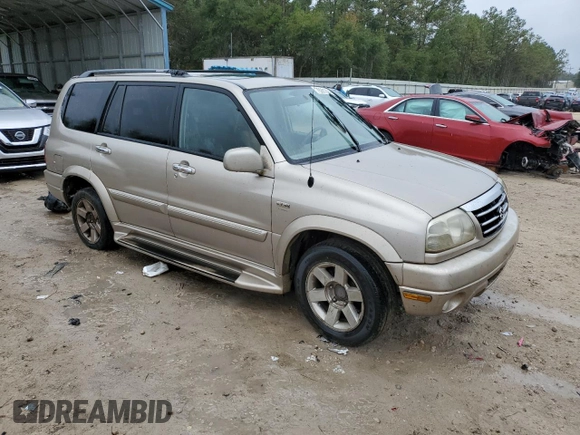 2001 Suzuki XL7 Touring z VIN JS3TY92V714106251, wystawiony jako Copart lot #79281204 z przebiegiem 334 901 mil mil oraz Szkoda całkowita • Salvage title. Historia ofert i sprzedaży dostępna na DreamBid. Obrazek 4.