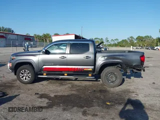 2018 Toyota Tacoma SR5 with VIN 3TMAZ5CN4JM069965, listed as a IAAI auction lot 41798238 with 124,619 mi miles and . Bid and sale history available at DreamBid. Image 15.