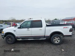 2003 Ford F-150 XLT with VIN 1FTRW08L43KA64328, listed as a IAAI auction lot 41932751 with 275,213 mi miles. Bid and sale history available at carsss.com. Image 14.