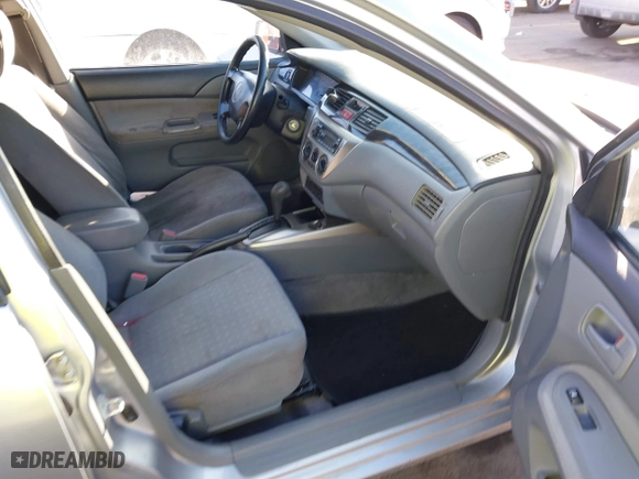 2004 Mitsubishi Lancer ES with VIN JA3AJ26E44U037047, listed as a IAAI auction lot 41545446 with 176,895 mi miles. Bid and sale history available at carsss.com. Image 5.