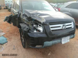 2006 Honda Pilot EX-L with RES with VIN 5FNYF28616B019530, listed as a IAAI auction lot 40564911 with 258,610 mi miles. Bid and sale history available at carsss.com. Image 6.