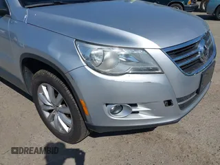 2011 Volkswagen Tiguan SE with VIN WVGBV7AX7BW529097, listed as a IAAI auction lot 42182690 with 139,878 mi miles and . Bid and sale history available at DreamBid. Image 6.