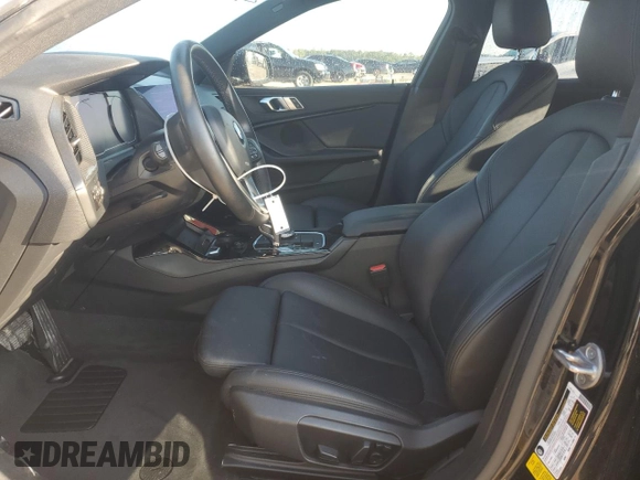 2021 BMW 2 Series 228i with VIN WBA53AK08M7H30753, listed as a Copart auction lot 49979925 with 65,784 mi miles and Salvage title. Bid and sale history available at DreamBid. Image 7.