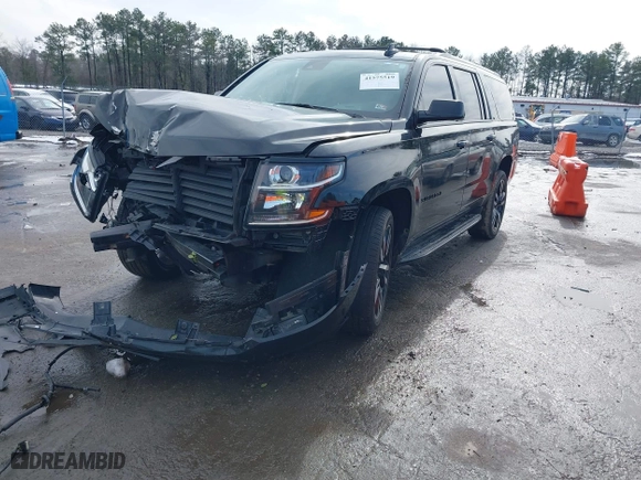2020 Chevrolet Suburban LT with VIN 1GNSKHKC3LR170868, listed as a IAAI auction lot 41575519 with 131,080 mi miles. Bid and sale history available at carsss.com. Image 2.