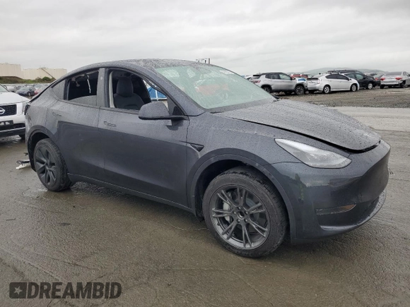 2024 Tesla Model Y with VIN 7SAYGDED6RF131193, listed as a Copart auction lot 47822735 with 10,007 mi miles and Salvage Title. Bid and sale history available at DreamBid. Image 4.