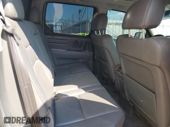 2007 Honda Ridgeline RTL w/Leather with VIN 2HJYK16567H520114, listed as a Copart auction lot 68681714 with 216,696 mi miles and Salvage Title. Bid and sale history available at carsss.com. Image 10.