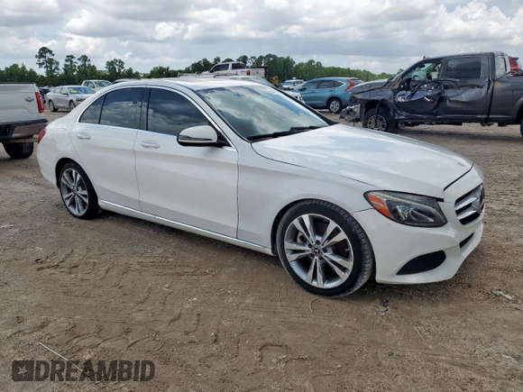 2018 Mercedes-Benz C 300 with VIN 55SWF4JB6JU245144, listed as a Copart auction lot 61415265 with 81,515 mi miles and Salvage title. Bid and sale history available at DreamBid. Image 4.