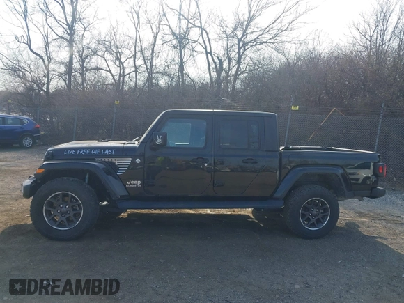 2021 Jeep Gladiator Overland z VIN 1C6HJTFG1ML606215, wystawiony jako IAAI lot #41771646 z przebiegiem 77 411 mil mil oraz . Historia ofert i sprzedaży dostępna na DreamBid. Obrazek 14.