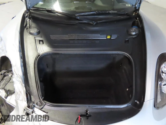 2014 Porsche Boxster with VIN WP0CA2A83ES120705, listed as a Copart auction lot 48166935 with 65,603 mi miles and Salvage title. Bid and sale history available at DreamBid. Image 7.