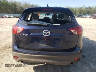 2013 Mazda CX-5 Touring with VIN JM3KE2CE0D0142102, listed as a Copart auction lot 51223575 with Not Provided miles and Salvage Title. Bid and sale history available at DreamBid. Image 6.