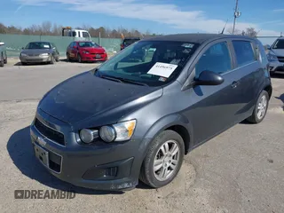 2013 Chevrolet Sonic LT with VIN 1G1JC6SB1D4164944, listed as a IAAI auction lot 41496975 with 96,987 mi miles. Bid and sale history available at carsss.com. Image 2.
