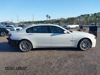 2014 BMW 7 Series ALPINA B7 with VIN WBAYE8C59ED134562, listed as a IAAI auction lot 41806222 with 120,043 mi miles. Bid and sale history available at carsss.com. Image 13.