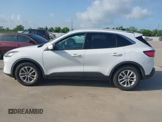 2020 Ford Escape SE z VIN 1FMCU0G67LUA10190, wystawiony jako IAAI lot #42533228 z przebiegiem 135 961 mil mil oraz . Historia ofert i sprzedaży dostępna na DreamBid. Obrazek 14.