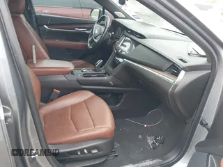 2021 Cadillac XT5 FWD Premium Luxury with VIN 1GYKNCRS5MZ128908, listed as a IAAI auction lot 41919571 with 51,280 mi miles and . Bid and sale history available at carsss.com. Image 5.