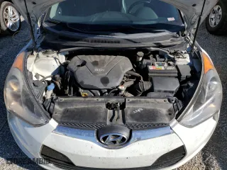 2013 Hyundai Veloster w/Gray Int with VIN KMHTC6AD6DU154098, listed as a Copart auction lot 77260374 with 159,049 mi miles and Non Repairable. Bid and sale history available at carsss.com. Image 11.
