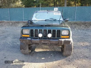 1999 Jeep Cherokee SE with VIN 1J4FF27S9XL667941, listed as a Copart auction lot 42429785 with 121,490 mi miles and Salvage title. Bid and sale history available at DreamBid. Image 5.