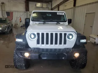 2021 Jeep Wrangler Unlimited Sport S z VIN 1C4HJXDG6MW777009, wystawiony jako Copart lot #60307665 z przebiegiem 30 634 mil mil oraz Szkoda całkowita • Salvage title. Historia ofert i sprzedaży dostępna na DreamBid. Obrazek 5.