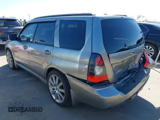 2007 Subaru Forester Sports XT with VIN JF1SG69687H733459, listed as a IAAI auction lot 41827464 with 139,943 mi miles. Bid and sale history available at carsss.com. Image 3.