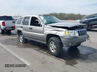 2000 Jeep Grand Cherokee Laredo z VIN 1J4GW48N5YC322707, wystawiony jako IAAI lot #42080677 z przebiegiem Nie podano mil oraz . Historia ofert i sprzedaży dostępna na DreamBid. Obrazek 1.