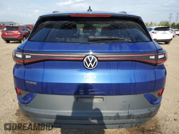 2021 Volkswagen ID.4 Pro S z VIN WVGTMPE25MP028583, wystawiony jako Copart lot #54329775 z przebiegiem Nie podano mil oraz Szkoda całkowita • Salvage title. Historia ofert i sprzedaży dostępna na DreamBid. Obrazek 6.