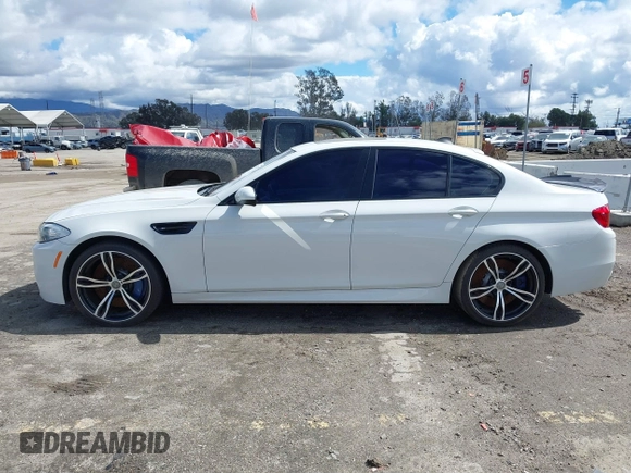 2013 BMW M5 with VIN WBSFV9C56DC772961, listed as a IAAI auction lot 41765457 with 104,568 mi miles. Bid and sale history available at carsss.com. Image 14.