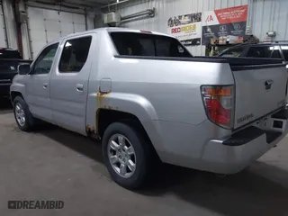 2006 Honda Ridgeline RTL with VIN 2HJYK16546H520899, listed as a IAAI auction lot 41899874 with 3,202,741 mi miles. Bid and sale history available at carsss.com. Image 3.