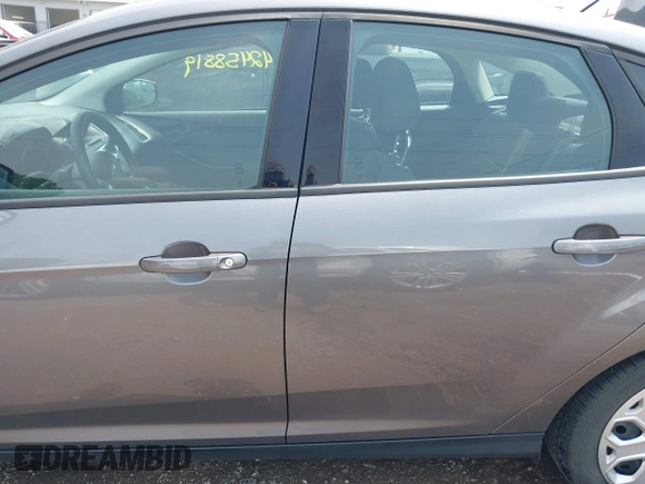 2012 Ford Focus SE with VIN 1FAHP3F26CL186645, listed as a IAAI auction lot 42458819 with 99,470 mi miles and . Bid and sale history available at DreamBid. Image 14.