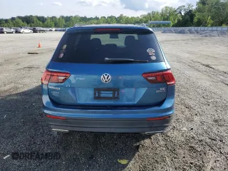 2018 Volkswagen Tiguan S with VIN 3VV0B7AX2JM019924, listed as a Copart auction lot 56138375 with 76,798 mi miles and Salvage title. Bid and sale history available at DreamBid. Image 6.
