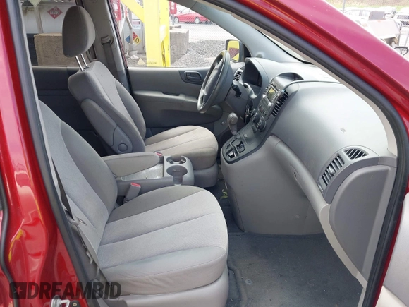 2012 Kia Sedona LX with VIN KNDMG4C71C6493153, listed as a IAAI auction lot 42176426 with 122,375 mi miles. Bid and sale history available at carsss.com. Image 5.
