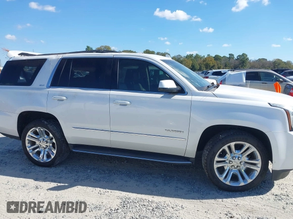 2019 GMC Yukon SLT with VIN 1GKS1BKC9KR332014, listed as a IAAI auction lot 40674460 with 76,545 mi miles. Bid and sale history available at carsss.com. Image 13.