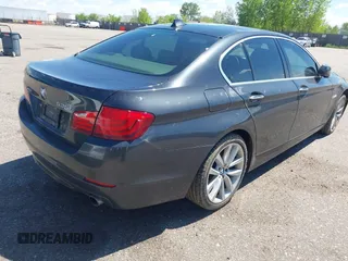 2013 BMW 5 Series 535i xDrive with VIN WBAFU7C51DDU71407, listed as a IAAI auction lot 42233098 with 211,608 mi miles and . Bid and sale history available at DreamBid. Image 4.