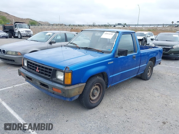 1990 Mitsubishi Mighty Max with VIN JA7FL24W8LP030657, listed as a IAAI auction lot 42014231 with 376,787 mi miles and . Bid and sale history available at DreamBid. Image 2.