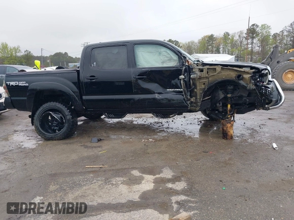 2015 Toyota Tacoma with VIN 3TMLU4EN9FM181683, listed as a IAAI auction lot 41980940 with 176,523 mi miles and . Bid and sale history available at DreamBid. Image 13.