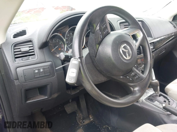 2013 Mazda CX-5 Sport with VIN JM3KE2BE1D0160254, listed as a IAAI auction lot 42256555 with 136,476 mi miles and . Bid and sale history available at DreamBid. Image 11.