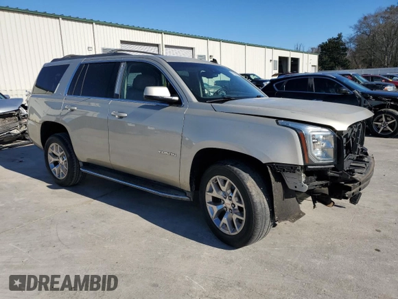2015 GMC Yukon SLT with VIN 1GKS1BKC7FR120802, listed as a Copart auction lot 87430984 with 191,829 mi miles and Salvage Title. Bid and sale history available at carsss.com. Image 4.
