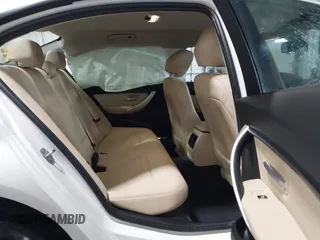 2018 BMW 3 Series 320i xDrive with VIN WBA8E5G56JNU47338, listed as a IAAI auction lot 41238204 with 54,596 mi miles. Bid and sale history available at carsss.com. Image 8.