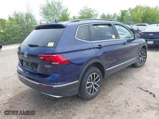 2021 Volkswagen Tiguan SE with VIN 3VV2B7AXXMM084355, listed as a IAAI auction lot 39559023 with 1 mi miles. Bid and sale history available at carsss.com. Image 4.