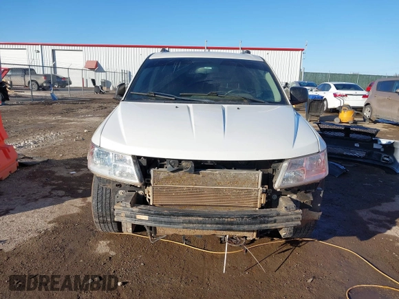 2017 Dodge Journey SE z VIN 3C4PDCAB3HT707029, wystawiony jako IAAI lot #41406306 z przebiegiem 104 046 mil mil oraz . Historia ofert i sprzedaży dostępna na DreamBid. Obrazek 13.