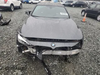 2015 BMW M4 with VIN WBS3R9C54FK330180, listed as a Copart auction lot 40706044 with 69,474 mi miles. Bid and sale history available at carsss.com. Image 5.