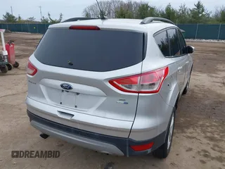2016 Ford Escape SE with VIN 1FMCU9G94GUC06902, listed as a IAAI auction lot 41432640 with 200,575 mi miles. Bid and sale history available at carsss.com. Image 4.