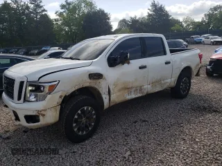 2017 Nissan Titan SV with VIN 1N6AA1E5XHN566626, listed as a Copart auction lot 55854255 with 141,960 mi miles and Salvage title. Bid and sale history available at DreamBid. Image 1.